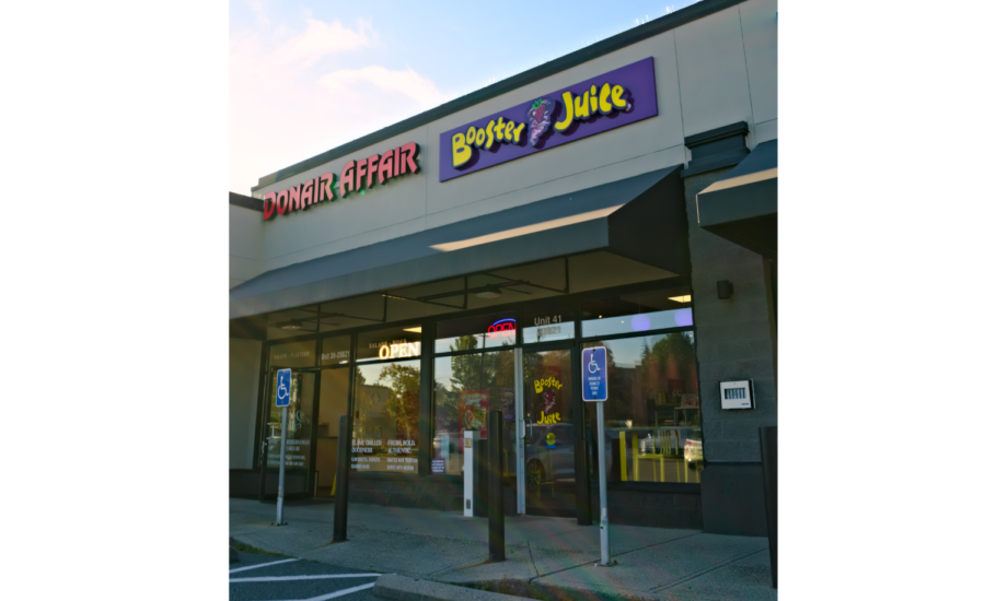 Completed interior customer ordering counter of a Booster Juice franchise renovation at Fraser Crossing in Langley.