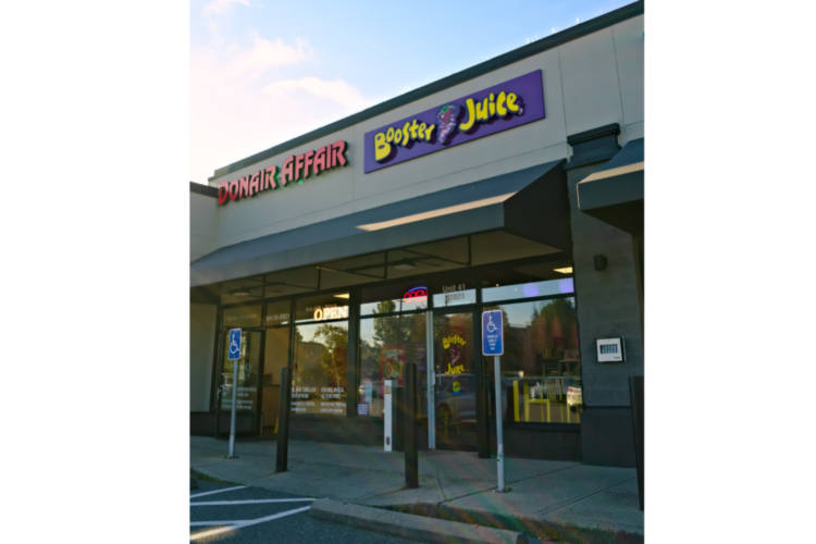 Completed interior customer ordering counter of a Booster Juice franchise renovation at Fraser Crossing in Langley.