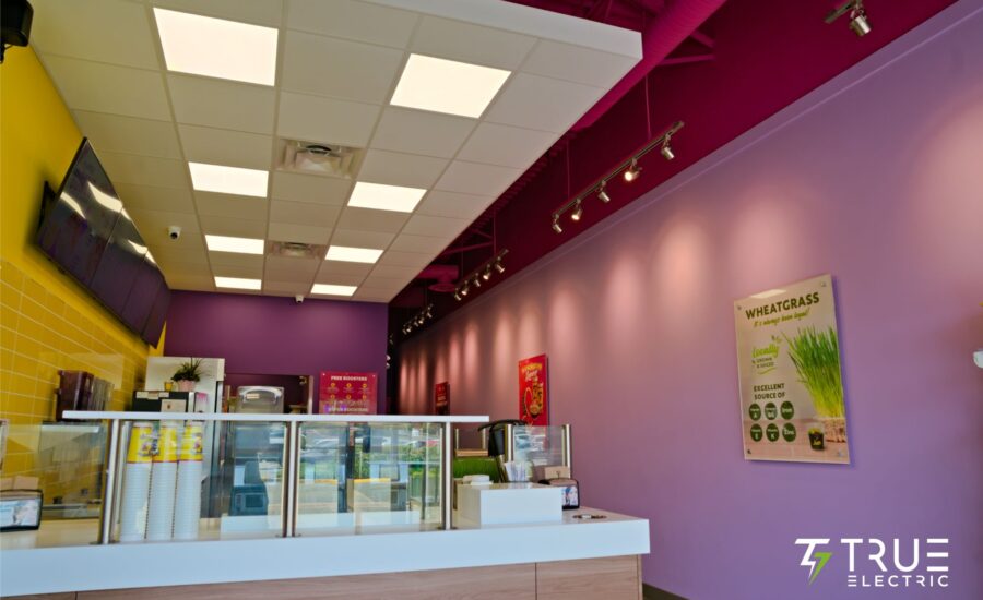Completed modern interior ordering counter of a Booster Juice franchise renovation in Surrey