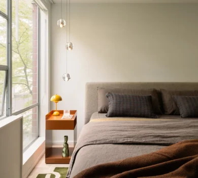 Bespoke master bedroom in a South Granville townhome featuring a high-end Bocci pendant light fixture.