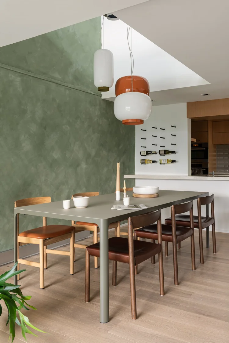 Modern open-concept living room and custom millwork in a luxury South Granville townhome renovation.