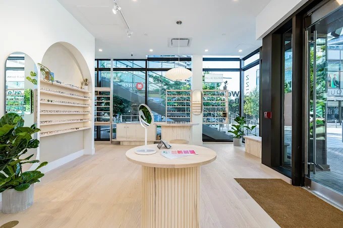 Modern open-concept showroom of the renovated Ollie Quinn eyewear boutique in Brentwood Plaza, Burnaby